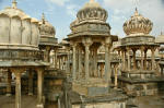 These are not tombs, nor do they contain ashes; instead these are memorials built by the two succeeding generations of a maharana. 