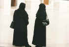 Two women hanging out in the old city of Damascus